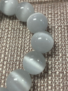 PowerBeads by jen Calcite with heart medal