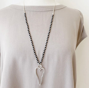 Silver open heart adjustable necklace with black beads