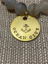 Load image into Gallery viewer, PowerBeads by jen Agate with Ocean City medal
