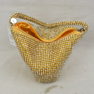 Rhinestone Studded Gold Wristlet Bag